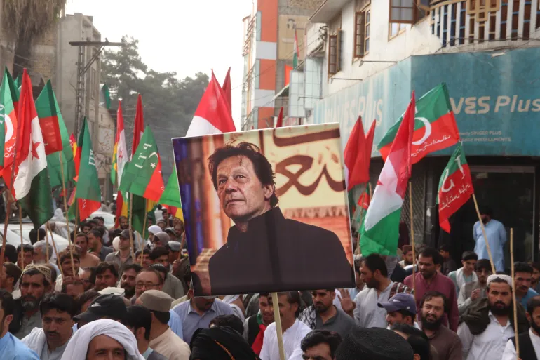 Imran Khan supporters carrying Imran khan picture in a protest